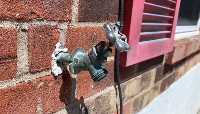 Changing Soldered Outdoor Faucet on Brick Wall